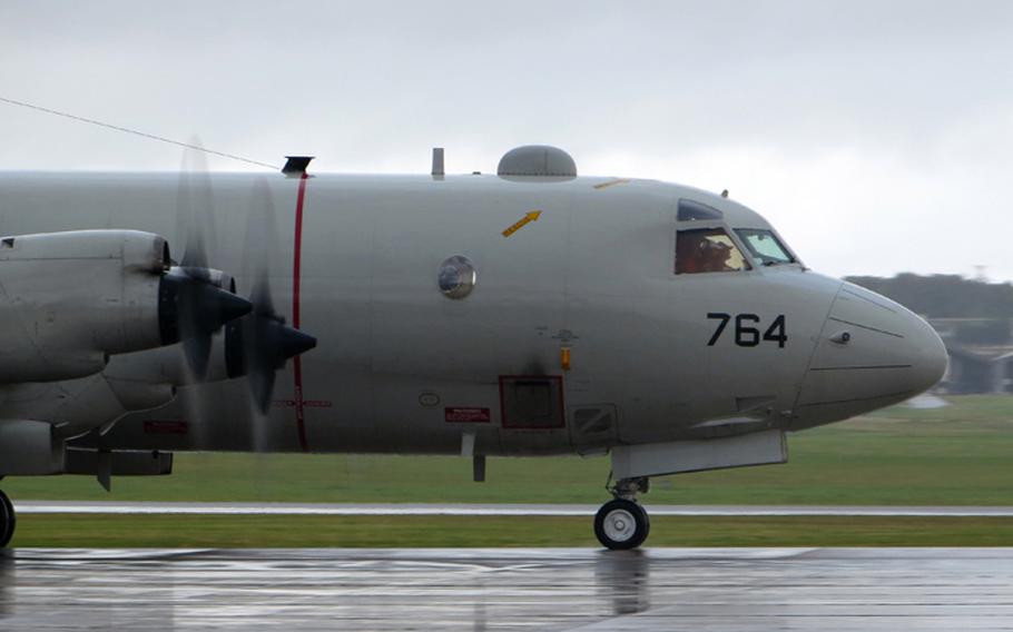 A P-3C Orion patrol craft departs from Kadena Air Base in Okinawa, Japan to aid in the search efforts of the missing Malaysia Airlines flight MH370. The P-3C brings long-range search, radar and communications capabilities to the efforts. The flight had 227 passengers from 14 nations, mainly China, and 12 crew members. According to the Malaysia Airlines website, three Americans, including one infant, were also aboard. 