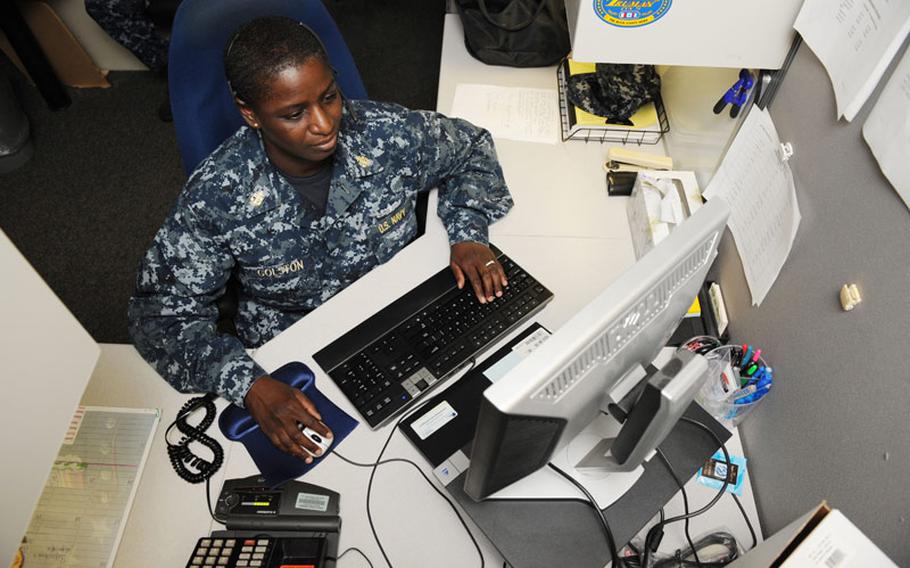 Chief Operations Specialist Tonye Golston, a Navy detailer, reviews job assignments in Career Management System/Interactive Detailing on July 22, 2011. Navy Personnel Command generates permanent change of station orders for more than 328,000 active-duty sailors.