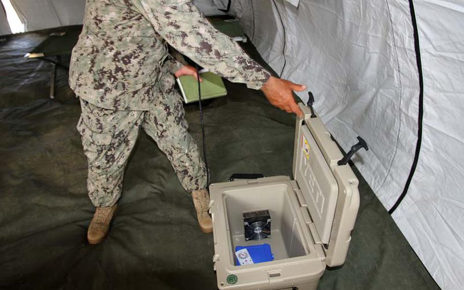 Among the sustainable-energy equipment being tested by the Navy during the Rim of the Pacific exercises Saturday, July 12, 2014, was a solar-powered cooler.