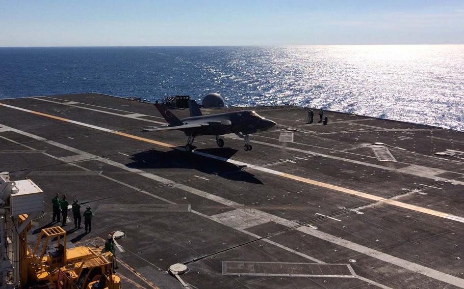 An F-35C makes the aircraft's 1st arrested carrier landing, aboard the USS Nimitz, on Monday, Nov. 3, 2014, near San Diego.