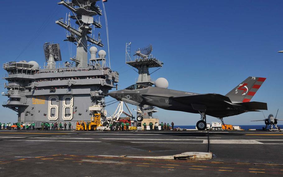 An F-35C makes its 1st arrested landing aboard the aircraft carrier USS Nimitz, off the coast of San Diego, on Monday, Nov. 3, 2014.