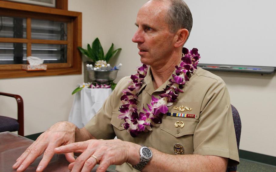 Adm. Jonathan Greenert, chief of naval operations, talks to reporters at Joint Base Pearl Harbor-Hickam in Honolulu on Friday, Feb. 6, 2015.