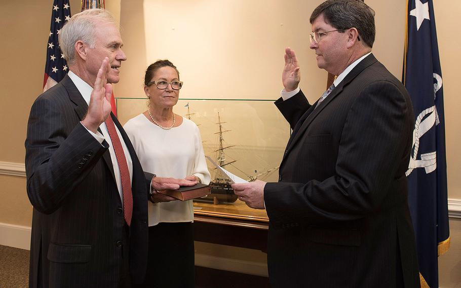 Richard V. Spencer is sworn in as the 76th Secretary of the Navy on Thursday, Aug. 3, 2017 by William O'Donnell, Department of the Navy administrative assistant. 