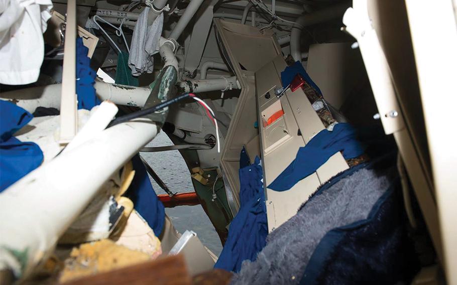 Internal view through Berthing 3 of the USS John S. McCain as seen after its collision with the merchant vessel Alnic MC while underway east of the Straits of Malacca and Singapore on Aug. 21, 2017.