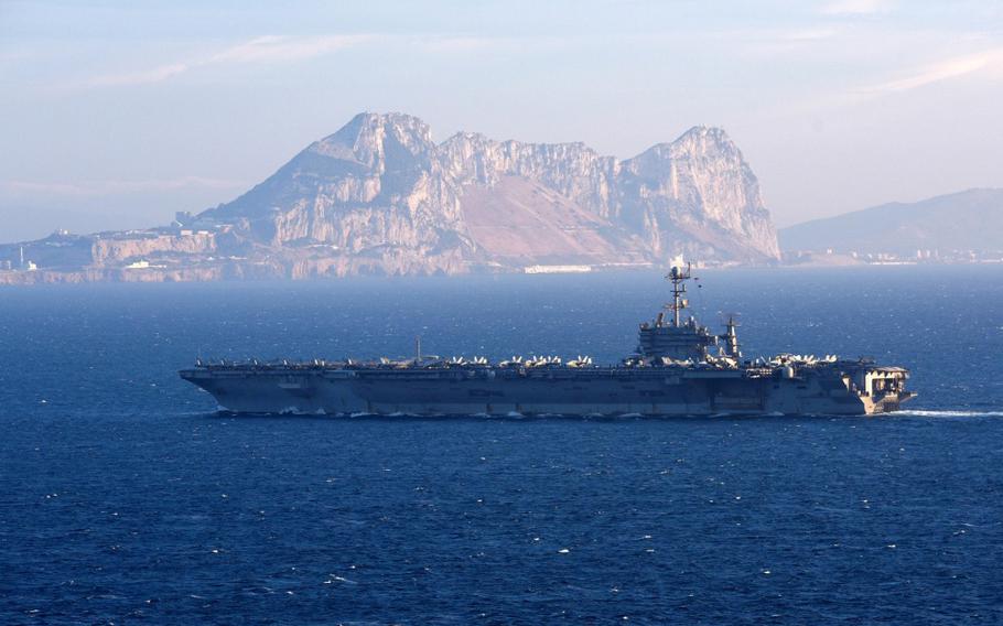 The Nimitz-class aircraft carrier USS Harry S. Truman (CVN 75) transits from the Mediterranean Sea through the Strait of Gibraltar into the Atlantic Ocean on June 28, 2018.