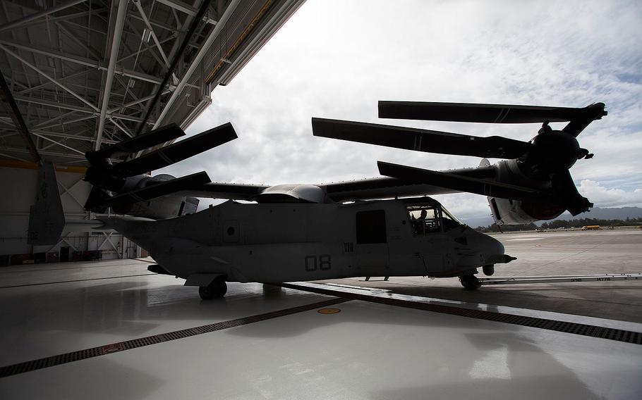 Marines park an MV-22 Osprey aircraft inside Hangar 7 prior to Hurricane Lane's arrival at Marine Corps Air Station Kaneohe Bay in Hawaii on Aug. 22, 2018.