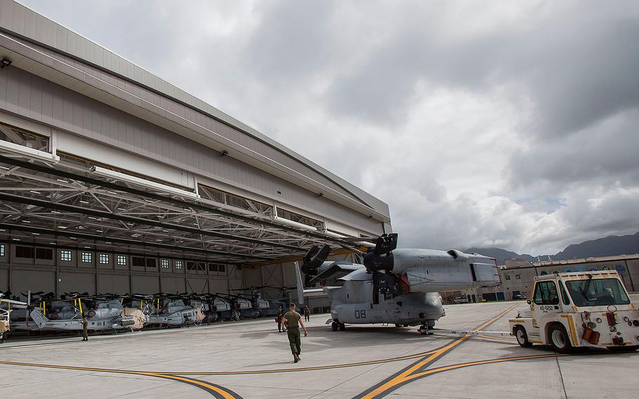 Marines park an MV-22 Osprey aircraft inside Hangar 7 at Marine Corps Air Station (MCAS) Kaneohe Bay on Aug. 22, 2018 ahead of Hurricane Lane.