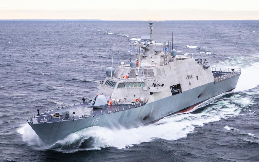 The future littoral combat ship Billings conducts acceptance trials on Lake Michigan, Dec. 6, 2018. The commanding officer of the ship has been removed from duty after a collision between it and a cargo ship on St. Lawrence River in Montreal.
