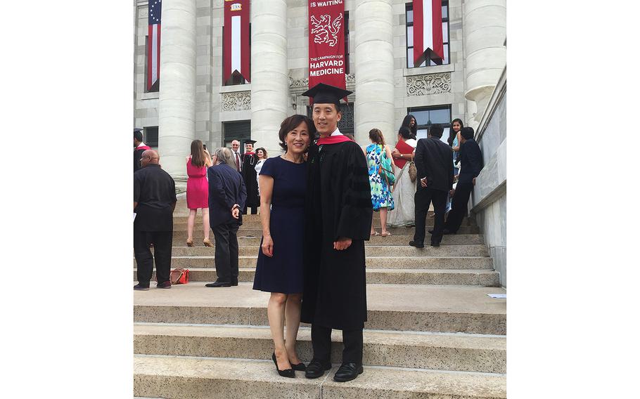 Former enlisted Navy SEAL Jonny Kim – now a lieutenant in the Navy Reserve who completed astronaut training Jan. 10, 2020 – is seen in his graduation cap and gown at Harvard University.