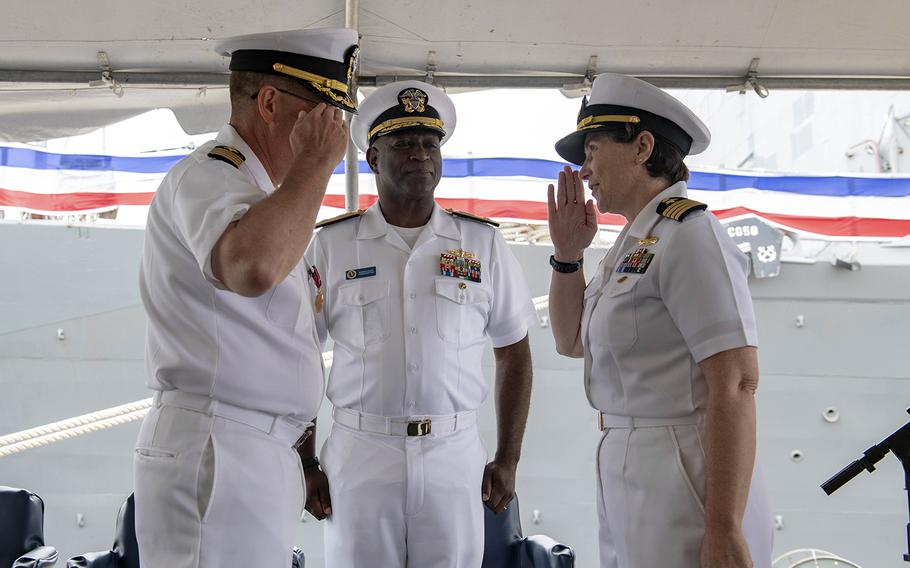 Capt. Erica L. Hoffmann, right, takes command of the guided-missile cruiser USS Philippine Sea in Mayport, Fla., April 26, 2019. 