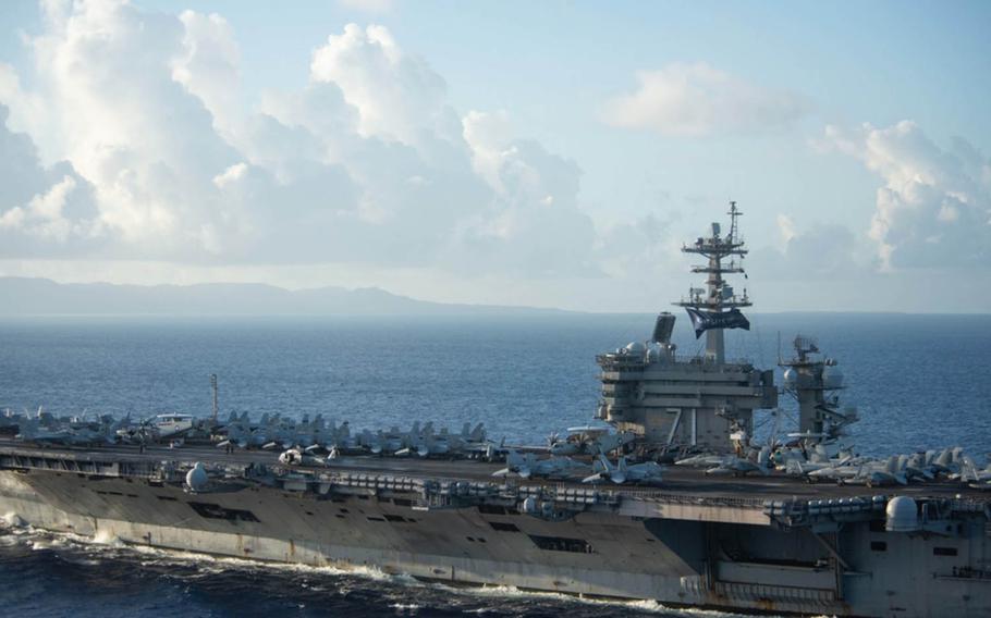 The aircraft carrier USS Theodore Roosevelt approaches Apra Harbor, Guam, June 3, 2020.