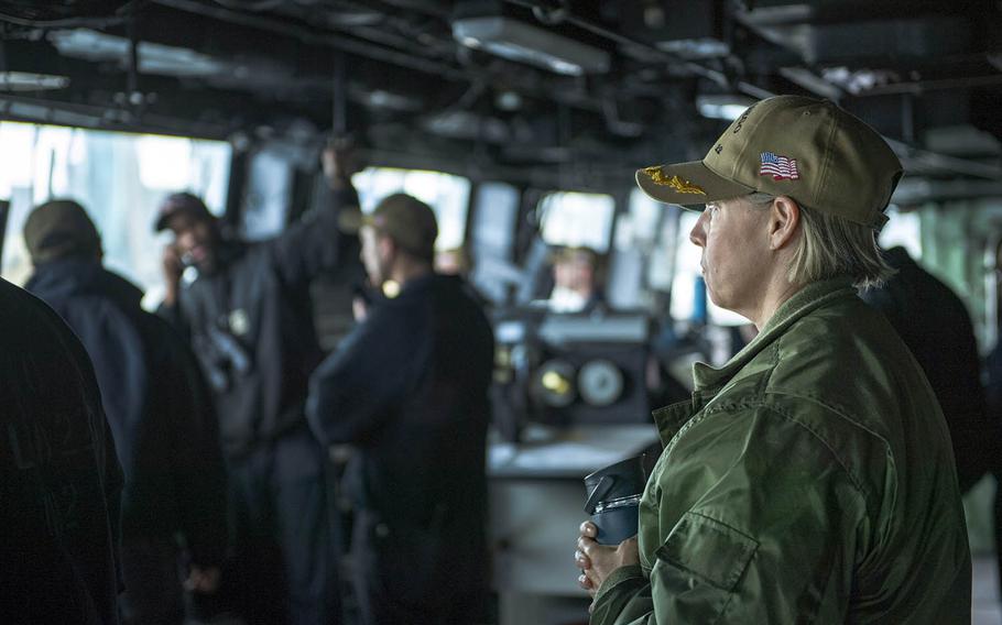 Capt. Amy Bauernschmidt, commander of the amphibious transport dock ship USS San Diego, observes sea and anchor detail on the bridge of the ship in San Diego, March 2, 2020.  