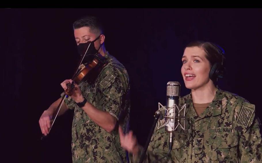 Members of the U.S. Navy Band perform a sea-shanty version of Taylor Swift's "We Are Never Ever Getting Back Together" in this screenshot from a video posted to Twitter, Monday, Jan. 25, 2021.