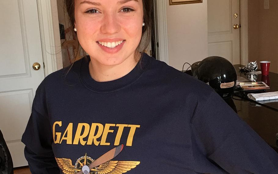 U.S. Coast Guard Ensign Morgan Garrett, a student naval aviator, is seen in an undated photo. Garrett and Navy Lt. Rhiannon Ross, an instructor pilot, died Oct. 23, 2020 when their T-6B Texan II trainer aircraft crashed in Foley, Ala.