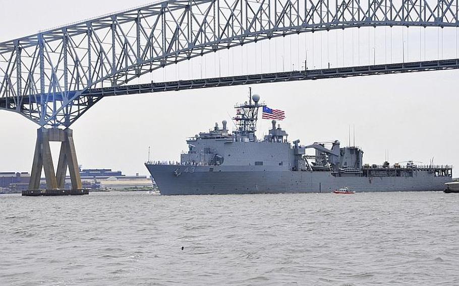 The amphibious dock landing ship USS Fort McHenry passes under the Francis Scott Key Bridge on its way to Baltimore Harbor for Baltimore Navy Week 2012. The Fort McHenry is scheduled to change homeport to Naval Station Mayport, Fla., in 2014, a move that comes after federal lawmakers axed funding in February for an aircraft carrier to move from Naval Station Norfolk, Va., to Mayport.