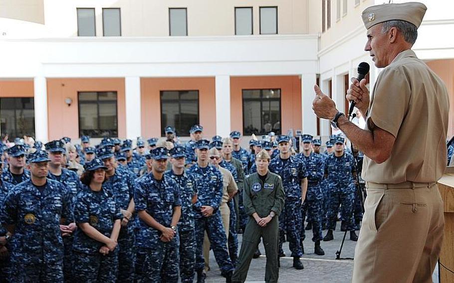 Vice Adm. Scott Van Buskirk, chief of naval personnel, talks about deployments, job performance and other issues with sailors and civilians Thursday at Naval Support Activity Naples, Italy.