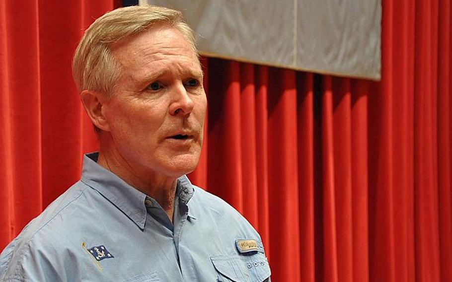 Secretary of the Navy Ray Mabus speaks with sailors at an all-hands meeting at Yokosuka, Japan, on July 16, 2012. Mabus discussed the strategy behind his "green fleet" of ships powered with biofuels, as well as the importance of the Pacific fleet.