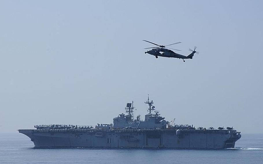 The USS Iwo Jima is shown under way Oct. 27  in the U.S. 5th Fleet area of responsibility. The Iwo Jima, the USS New York and the USS Gunston Hall were directed late November 2012 to remain on standby near the coast of Israel as a security precaution as the Gaza Strip conflict between Israel and Hamas escalated.