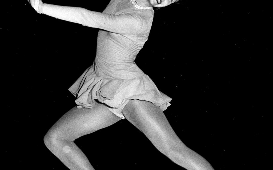 American figure skater Carol Heiss shows the form that enabled her to win the first of five consecutive world championships in the 1956 competition at Garmisch.