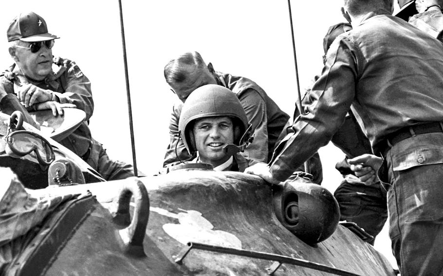 Years before another Democrat from Massachusetts, Michael Dukakis, donned a helmet and rode a tank to political disaster, Attorney General Robert Kennedy had a less eventful encounter with an armored vehicle during a visit to V Corps and the 3rd Armored Division at the Friedberg training area.