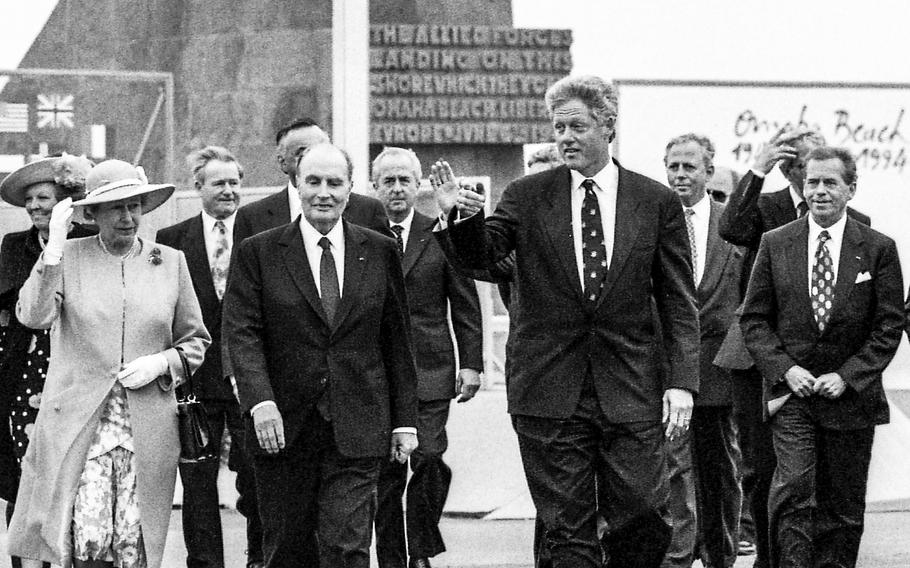 Queen Elizabeth II (front left) joins other heads of state at the 50th anniversary of the D-Day landing on Omaha Beach in June of 1994. 