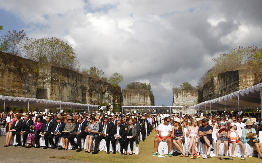 People attend a memorial service in Jimbaran in Bali, Indonesia, on Oct. 12, 2012, marking the 10th anniversary of the 2002 Bali bombings terrorist attacks that killed 202 people, including 88 Australians and seven Americans.