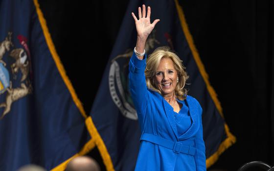First lady Jill Biden waves to the crowd as she takes the stage during the annual First Ladies Luncheon at the JW Marriott Grand Rapids, Mich., Friday, April 26, 2024. (Joel Bissell/Kalamazoo Gazette via AP)