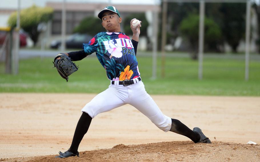 Kubasaki left-hander Luka Koja delivers against Kadena during Friday's Okinawa baseball game. Koja came within one out of a no-hitter as the Dragons won 19-0.
