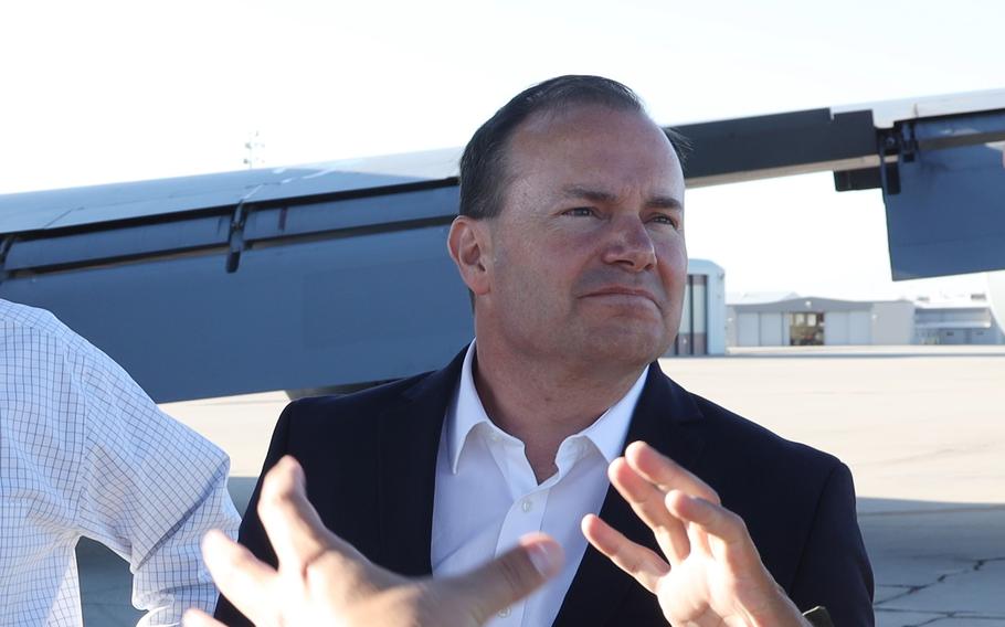 Sen. Mike Lee, R-Utah, listens to a mission briefing during a visit to Utah National Guard headquarters, Aug. 26, 2019.