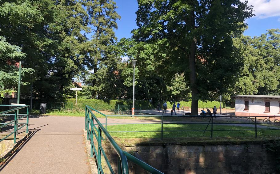 The footbridge across the Lauter River in Wissembourg, France, is part of a scenic walk from the train station to the city center.