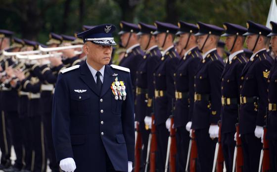 Gen. Kenichiro Nagumo, the first commander of Japan's Joint Operations Command, reviews troops ahead of the activation ceremony at Camp Ichigaya in central Tokyo, March 24, 2025.