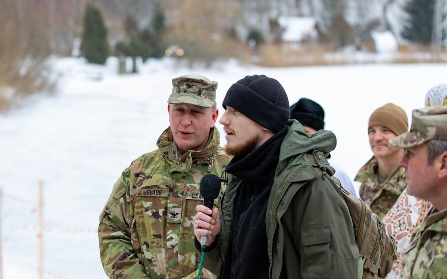 Florida National Guardsman Col. Blake Glass, commander of Task Force Gator’s 53rd Infantry Brigade, thanks the local community for welcoming them and allowing them to participate in a local religious tradition in an undisclosed location in Ukraine on Jan. 9, 2022. The Pentagon announced on Saturday, Feb. 11, that National Guard troops on a training mission in Ukraine have been pulled out of the country.