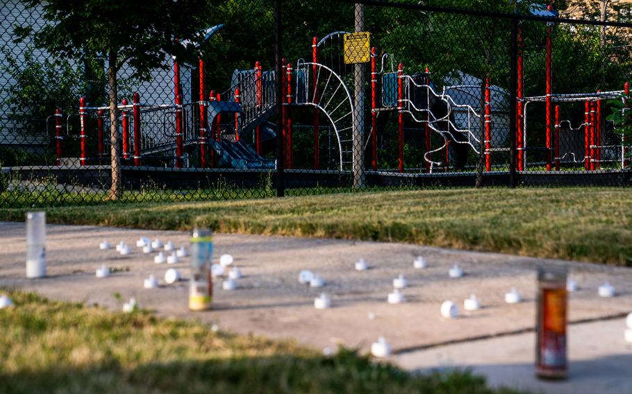 A memorial in front of a playground. A man was killed and two others were wounded near the playground while at a party on Chicago's South Side.