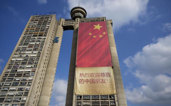 A large Chinese flag hangs on a skyscraper in Belgrade, Serbia, on May 4, 2024.