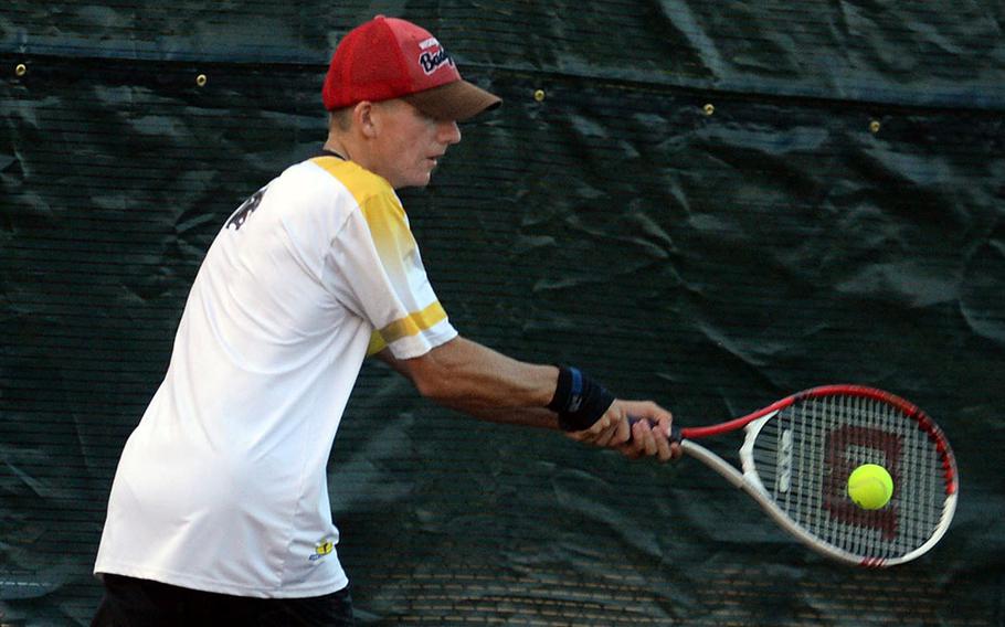 Kadena's Micah Berry slaps a backhand return.