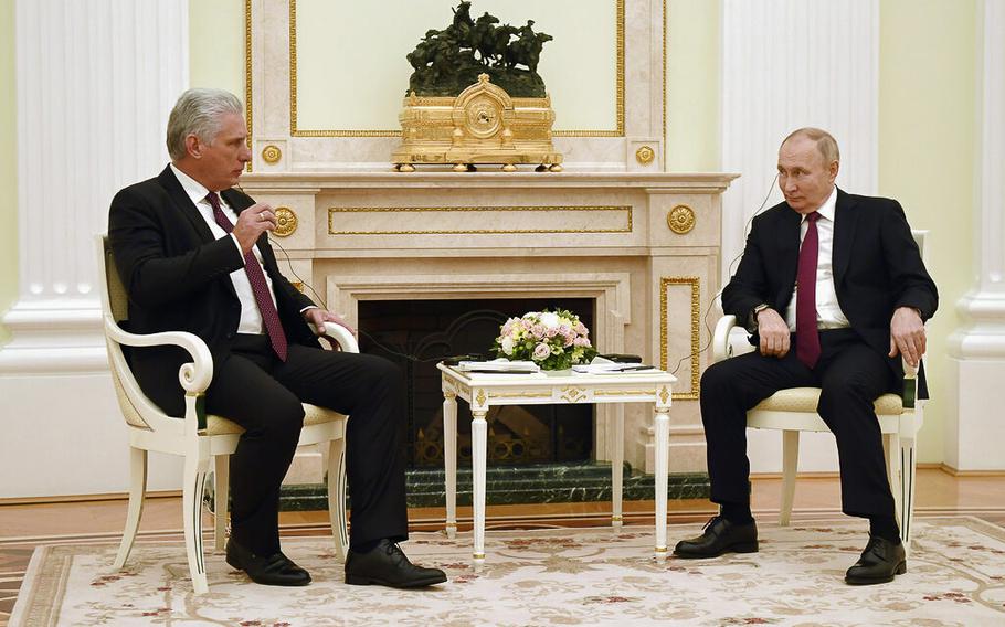 Russian President Vladimir Putin, right, holds talks with Cuban President Miguel Diaz-Canel Bermudez at the Kremlin in Moscow, Russia, Tuesday, Nov. 22, 2022. 
