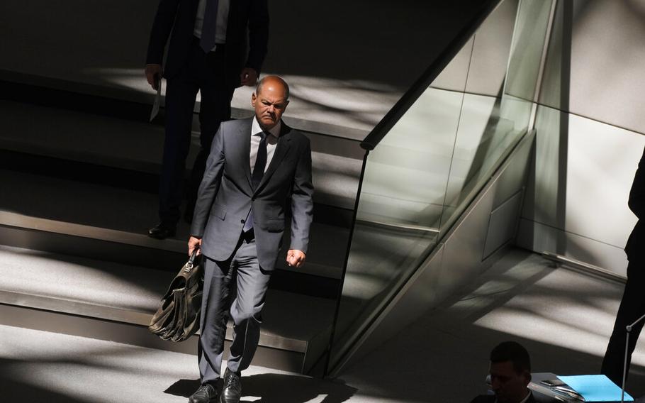 German Chancellor Olaf Scholz arrives for a speech at the German parliament Bundestag at the reichstag building in Berlin, Germany, Wednesday, June 22, 2022.