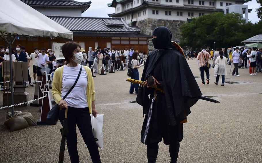 Shinobi, or ninja, and samurai actors in garb also roam the grounds of Nagoy Castle in Nagoya, Japan, and are open to posing for photographs.