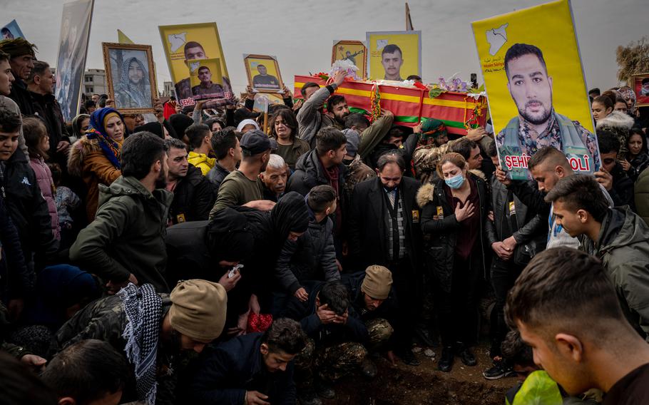 Familiy members, friends, security forces and residents of Qamishli mourn during the funerals for SDF fighters who were killed quelling the Hasakah prison break on Feb. 2. 
