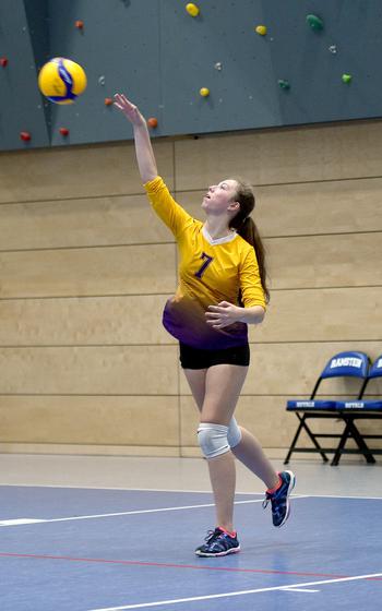 Bahrain's Isabella Garza serves during pool play of the DODEA European volleyball championships on Thursday at Ramstein High School at Ramstein Air Base, Germany.

Matt Wagner/Stars and Stripes