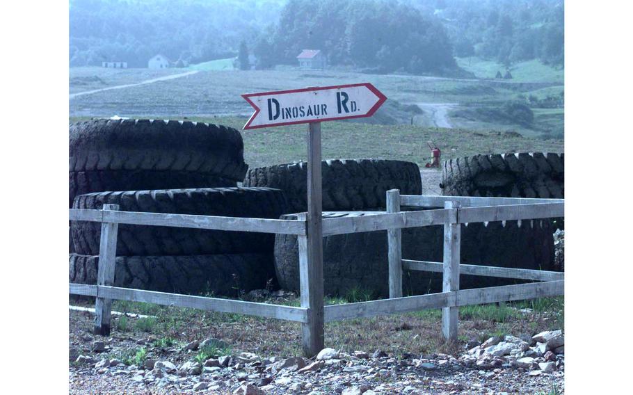 As you would expect to see in a camp named “Bedrock” — inspired by the classic “Flintstones” cartoon — a road sign marks Dinosaur Road.