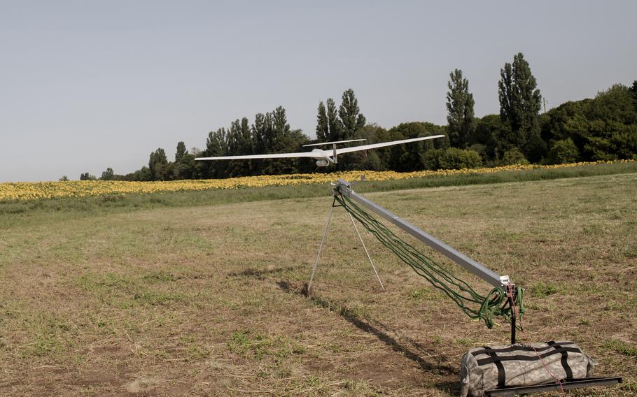 A Punisher strike drone, manufactured by UA Dynamics, is launched on a test flight outside Kyiv, Ukraine, on July 15, 2023. 