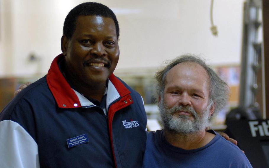 Gerrard Barnes, left, and Bruce Barker worked together with the Osan High School girls basketball team in the late 1990s. Barnes, 73, died after a long battle with cancer earlier this week.