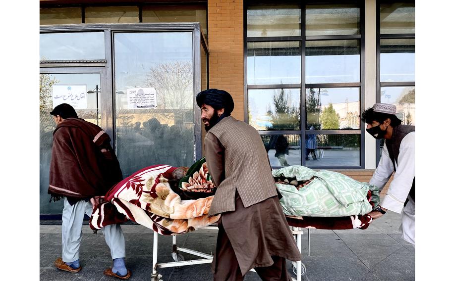 A patient is rushed into Kabul's Jumhuriat hospital's emergency ward as Afghanistan's humanitarian crisis deepens after international aid to the country was dramatically cut. 