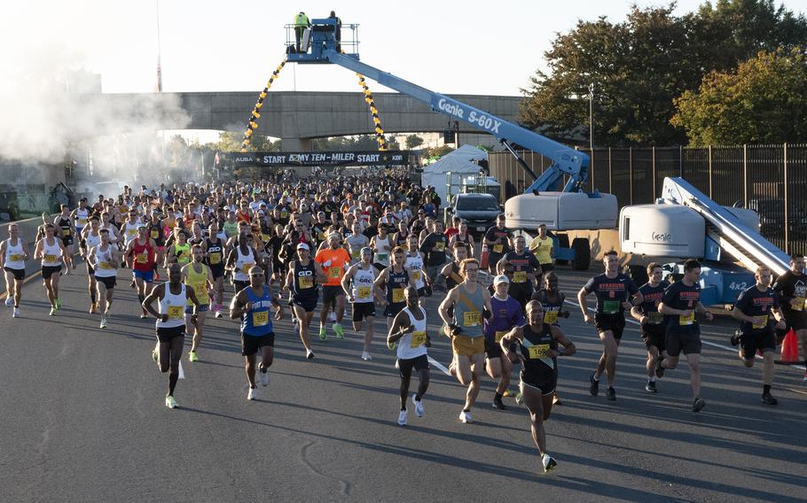 Runners in the Army 10-Miler break from the starting line Sunday, Oct. 9, 2022, at the Pentagon.