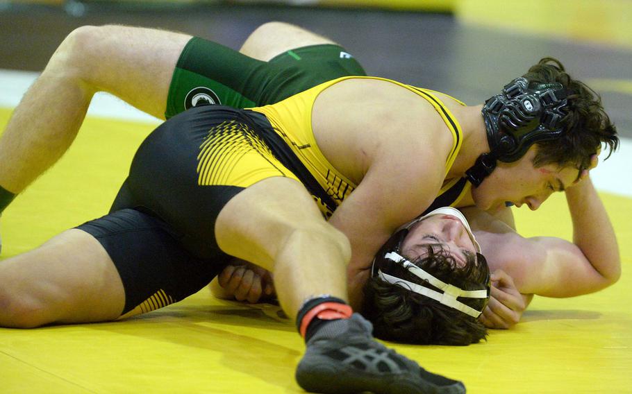 Kadena 172-pounder Carson Feuquay pins Kubasaski's Cole Strelke in 3 minutes, 30 seconds during Wednesday's Okinawa wrestling regular-season finale. The Panthers won the meet 34-28, completing a six-meet regulars-season sweep.