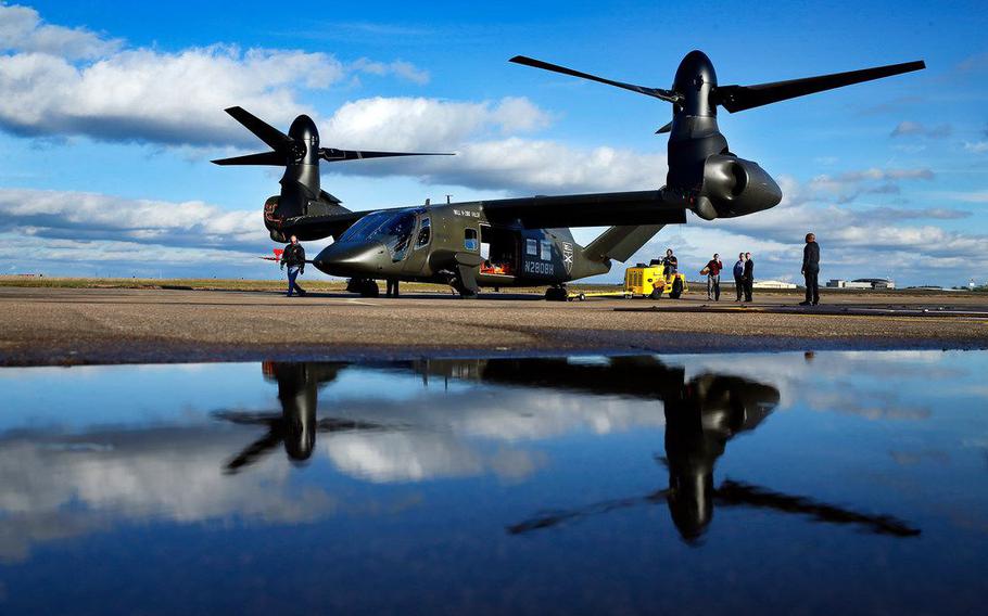 The V-280 Valor tilt-rotor, a next-generation aircraft that Bell wants to build for the U.S. military, was reflected in rain water after demonstrating its skills at the Bell Flight Research Center in Arlington.