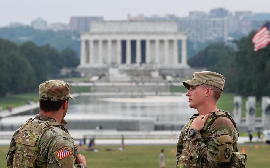 National Guardsmen patrol.