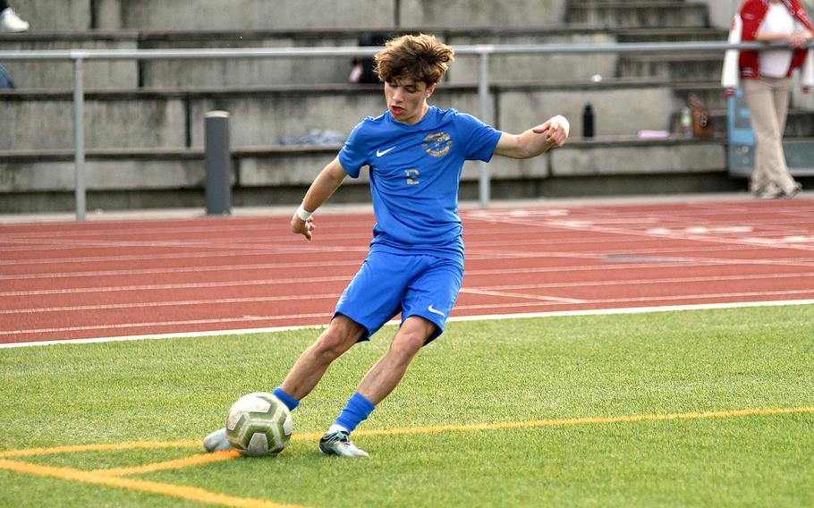 Ramstein sophomore Keiran Goodall hits a corner kick during a match against Kaiserslautern on April 12, 2024, at Ramstein High School on Ramstein Air Base, Germany.