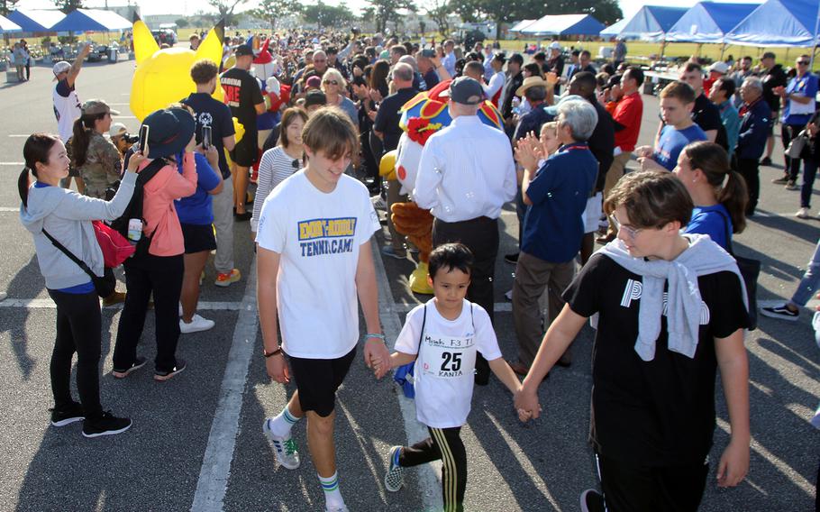 Athletes with physical and intellectual disabilities arrive for to compete in the Kadena Special Olympics at Kadena Air Base, Okinawa, Dec. 9, 2023.